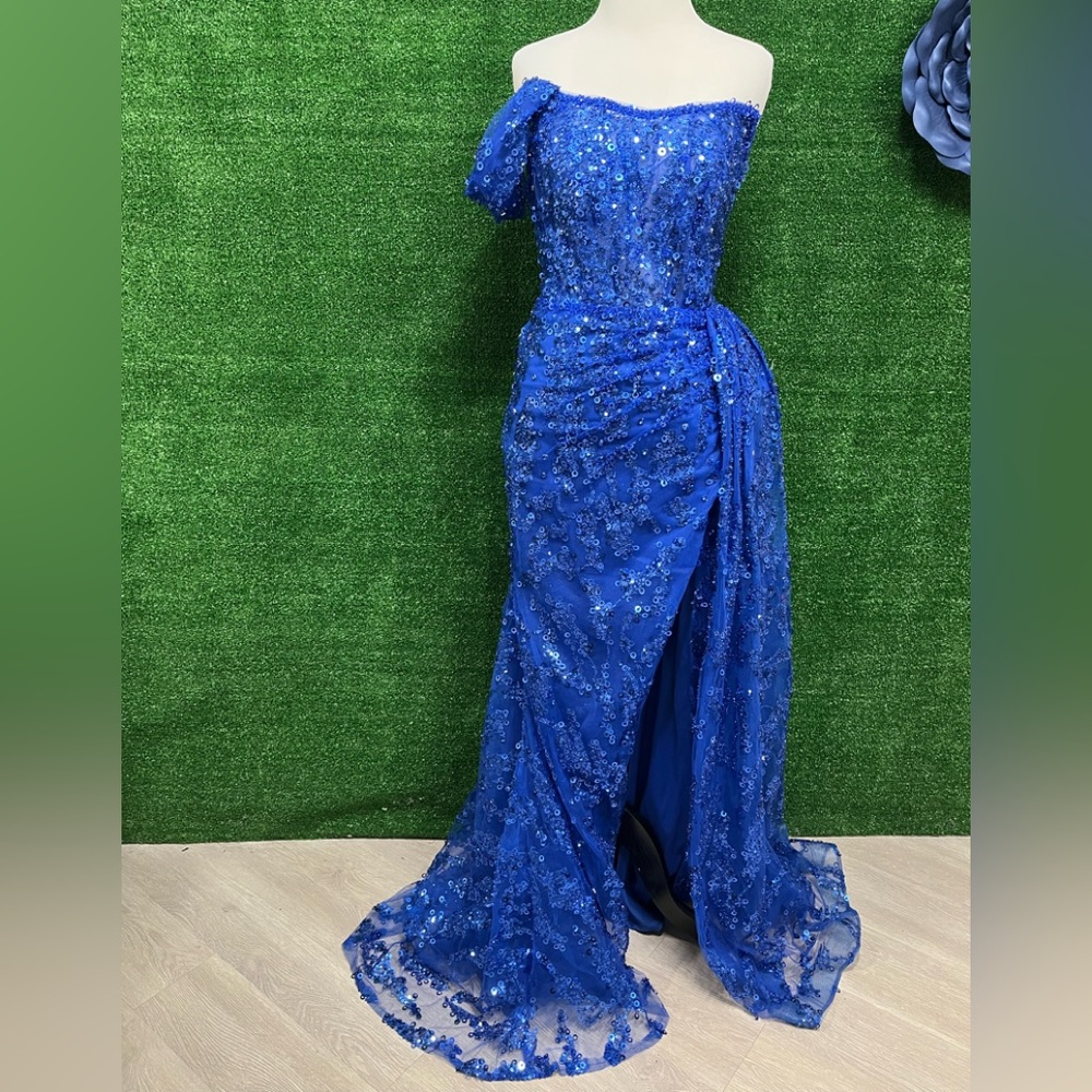 Catwalk Couture blue sequin gown size 10, fits like a small
